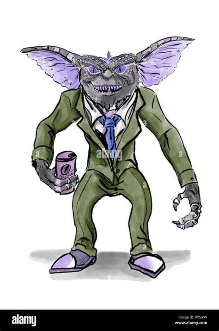 a gremlin in a suit drinking coffee Stock Photo Alamy